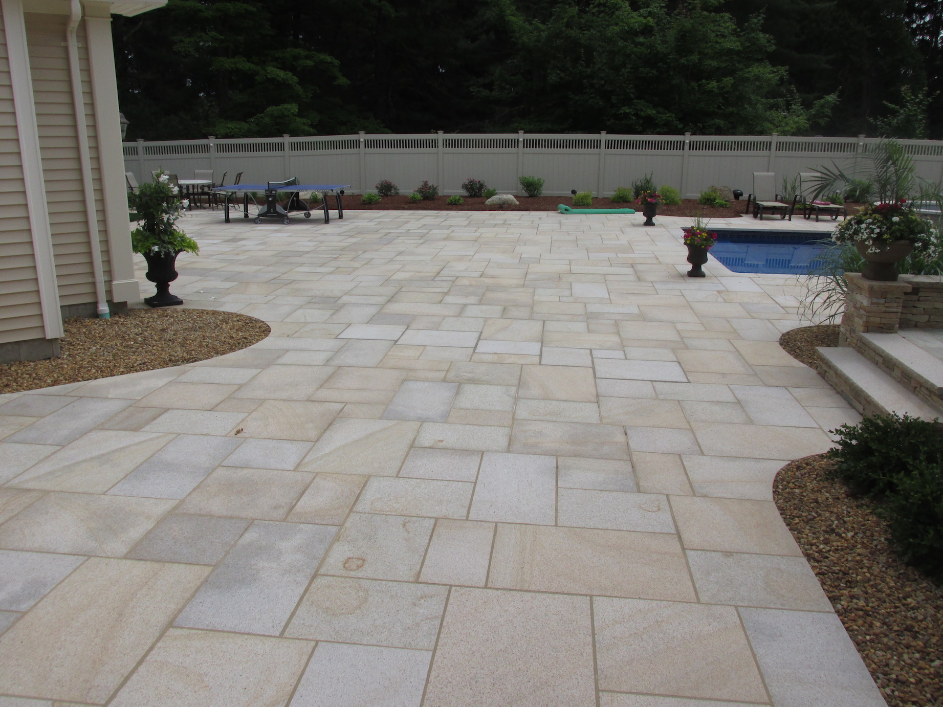 Outdoor living patio and walkway area designed for gathering and circulation